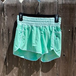 Lululemon mint running shorts with light blue trim (6)